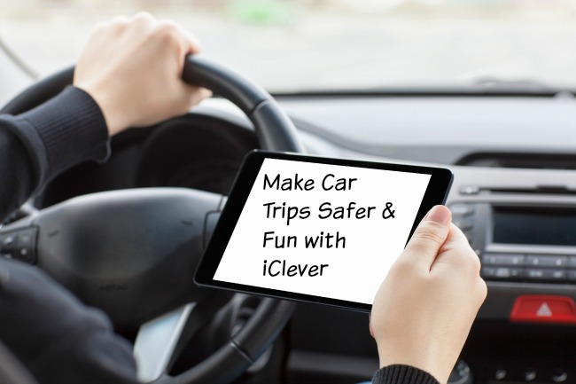 man sitting in the car and holding a touch tablet with isolated screen