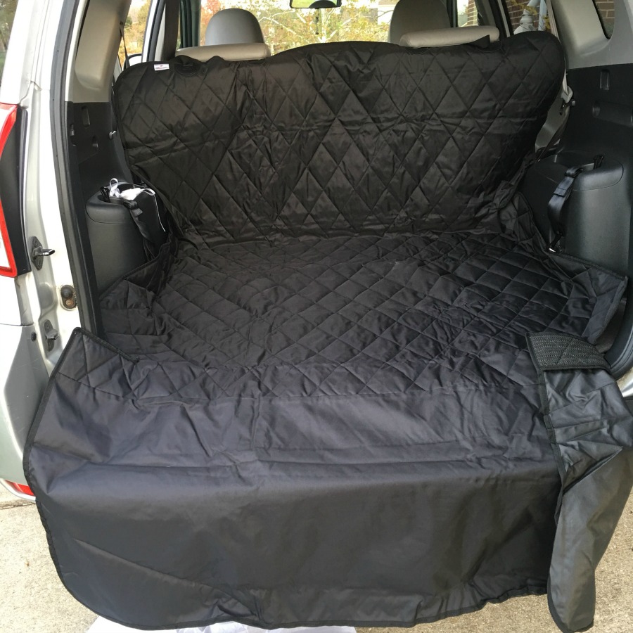 Want to make traveling comfortable for your dog & safe for your vehicle? See why we love the 4Knines SUV Cargo Cover here! 