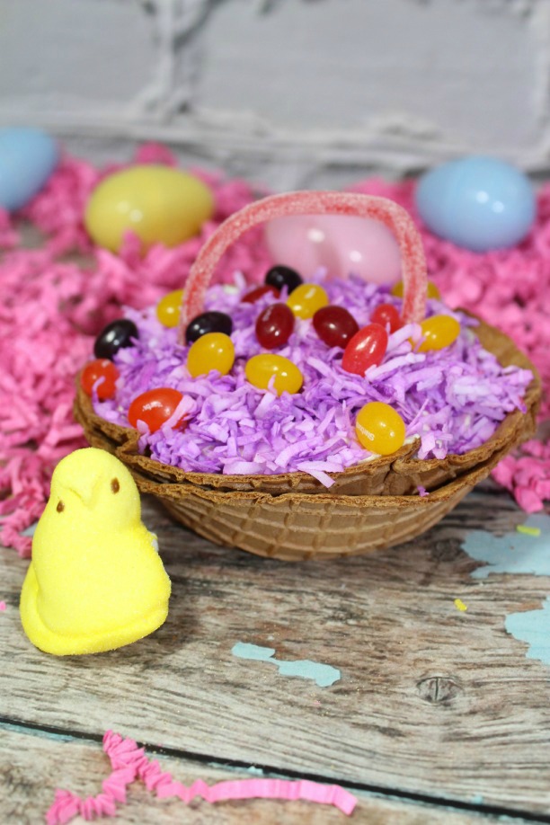 picture of yellow marshmallow peep and waffle cone basket with candy inside