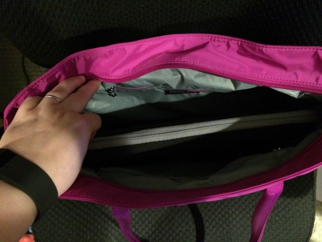 This tote easily fits a 12" ASUS Transformer laptop with lots of room to spare!