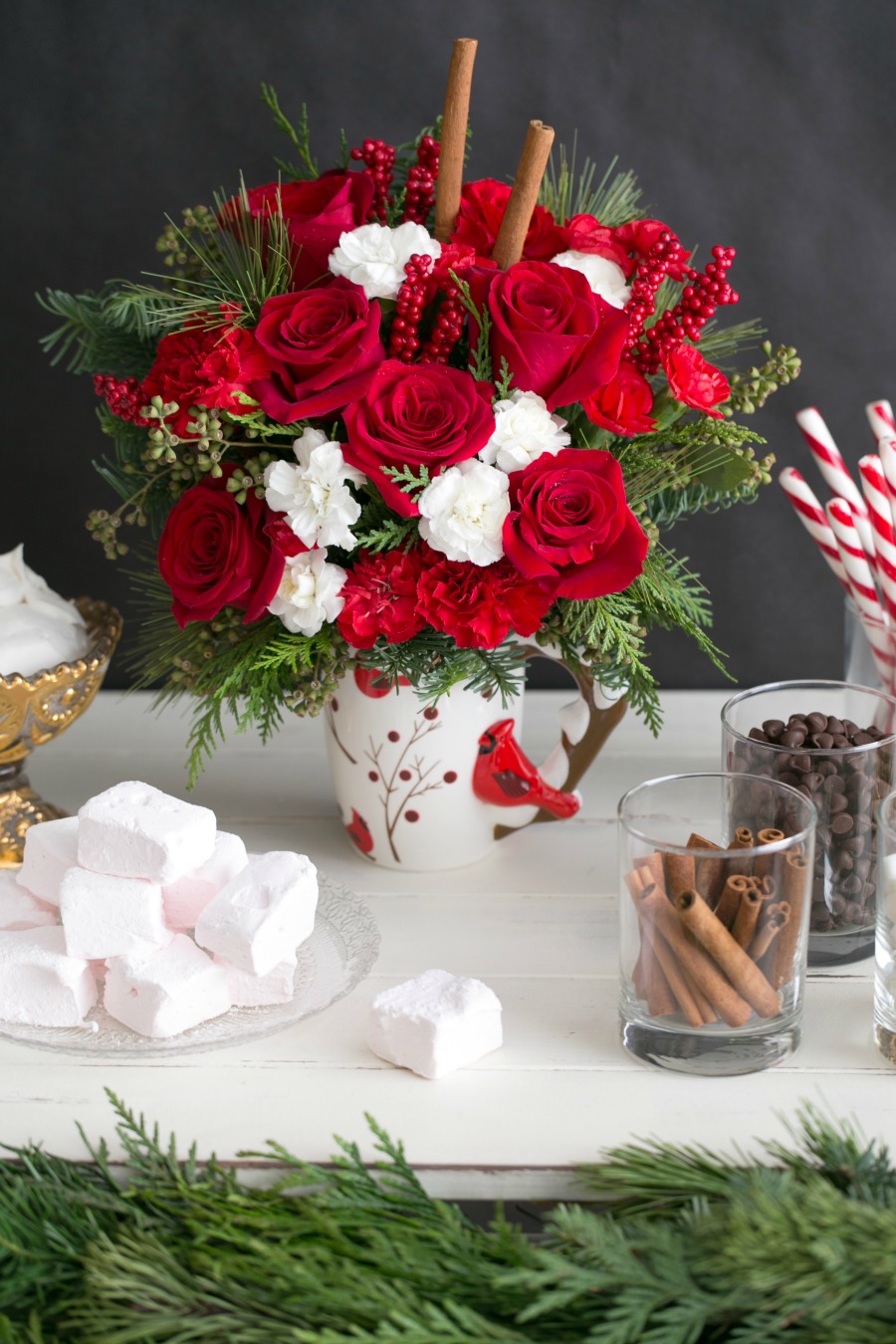 Looking for the perfect gift for someone this holiday season? See why we love the Send a Hug Christmas Cardinal Bouquet from Teleflora here!