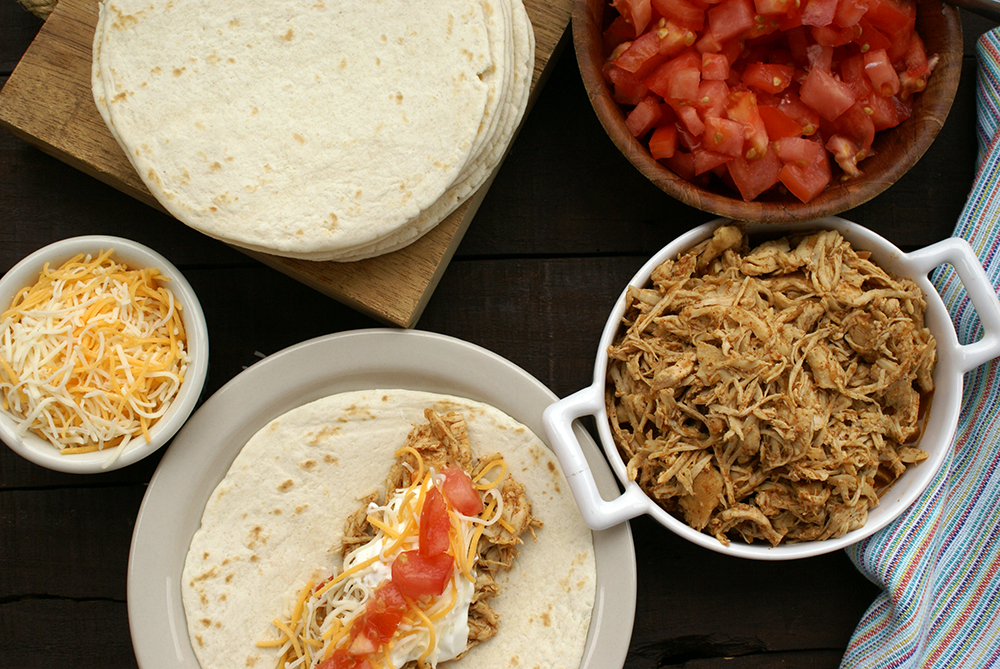 Looking for a delicious & easy taco recipe you can make at home? Check out our super yummy Instant Pot Chicken Tacos Recipe here!