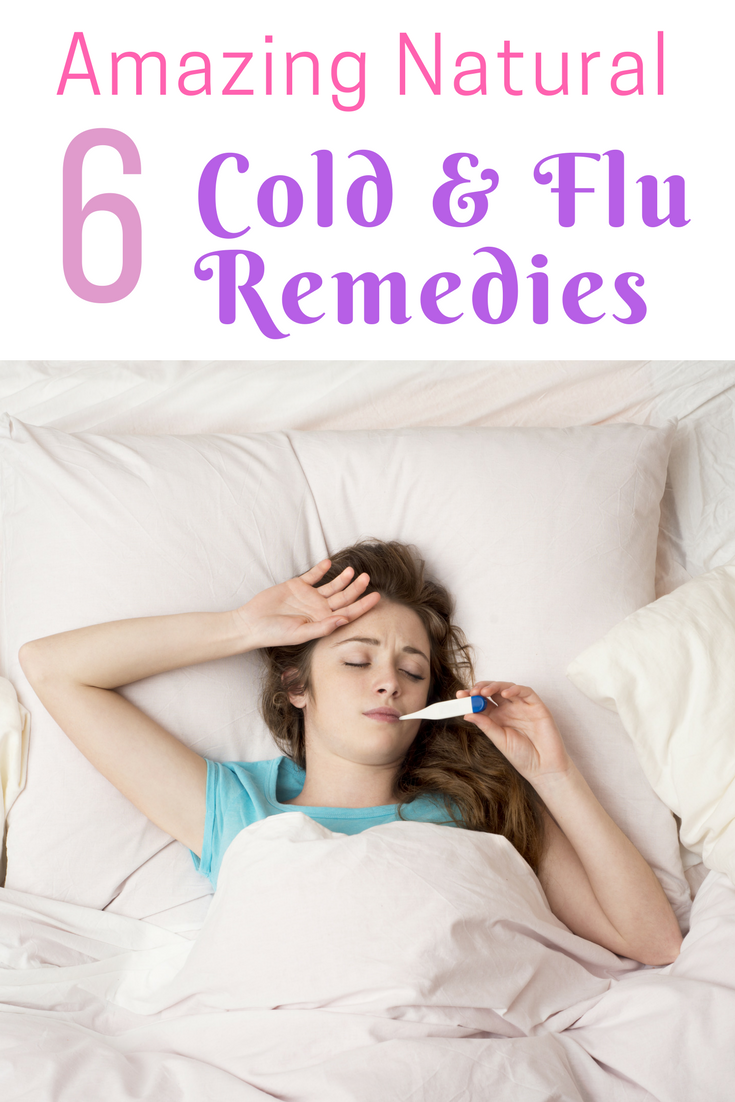 Picture of young brown haired sick woman taking temperature in bed with words 6 Amazing Natural Cold & Flu Remedies