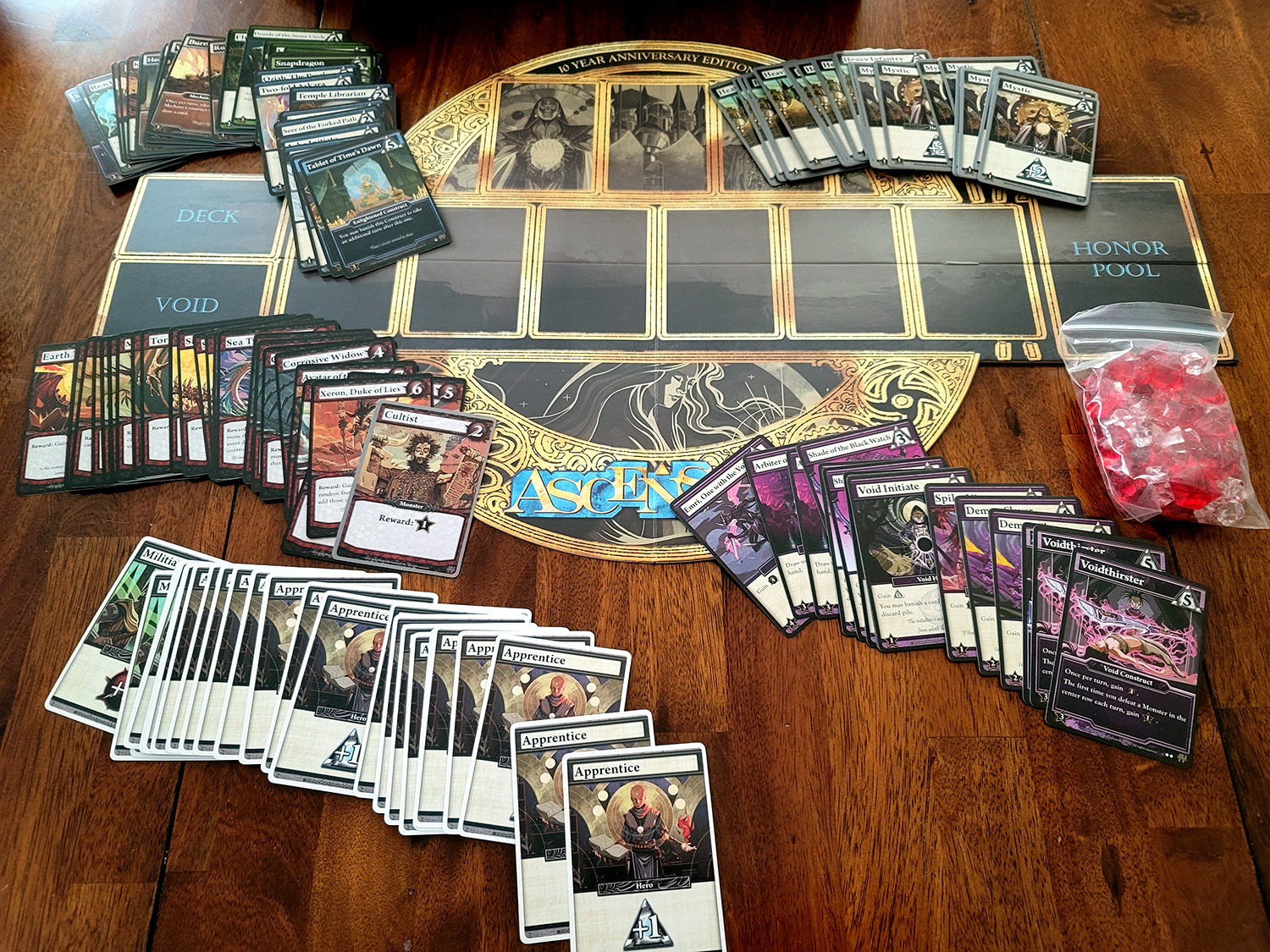  Spread of all the cards and board for Ascension Board Game