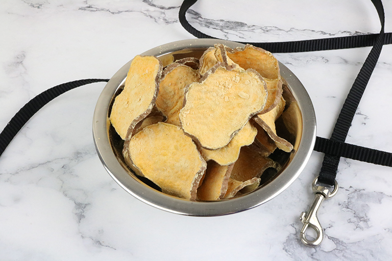 peanut butter sweet potato dog treats in a metal bowl
