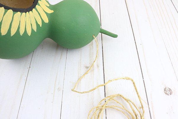 gourd birdhouse getting its hanger string