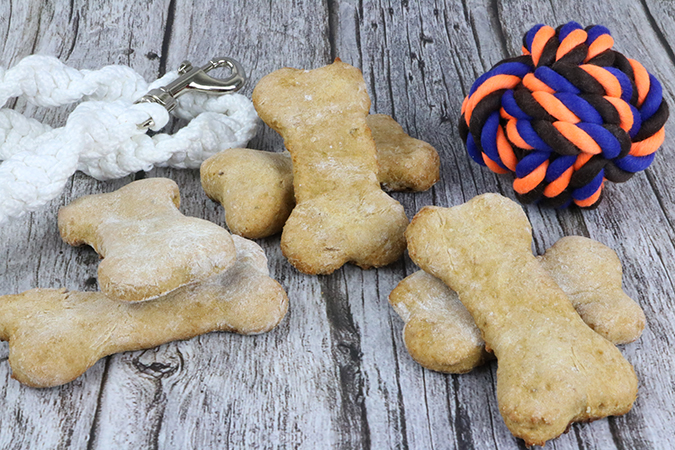 banana ginger dog treats with a ball and leash