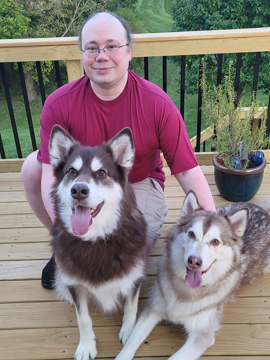 man wearing red big boy bamboo big and tall bamboo t-shirt with red alaskan malamutes