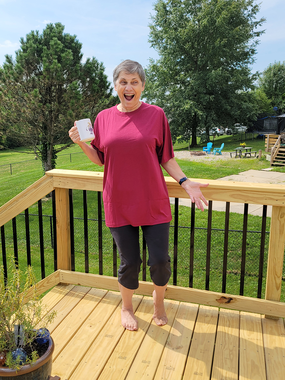 excited woman wearing one of Big Boy Bamboos red bamboo t-shirts