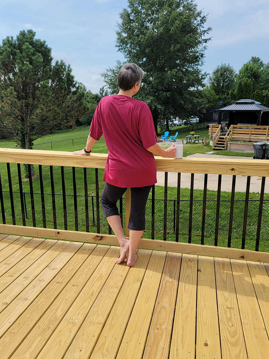 tall woman wearing one of the red Big Boy Bamboo bamboo t-shirts