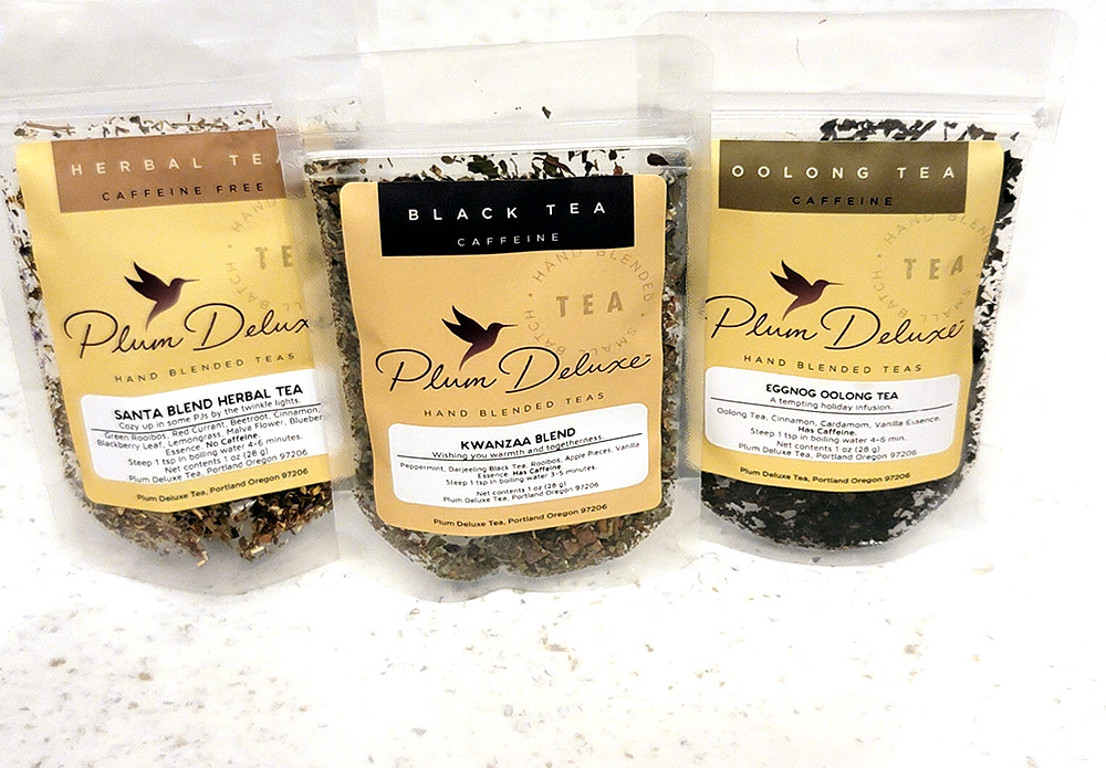 three bags of plum deluxe winter tea
