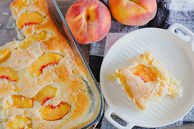 peach cobbler recipe with a bit of whip cream