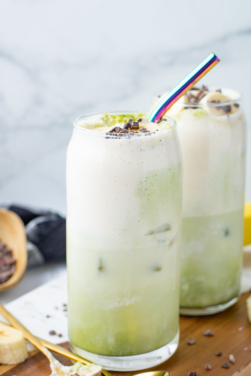 picture of a Banana Cream Matcha Latte ready to be served in a tall glass