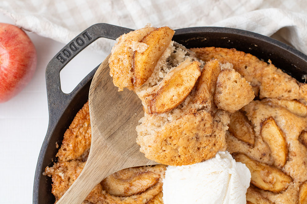 delicious apple pie cobbler recipe in a cast iron pan